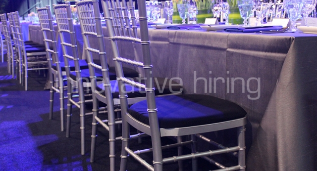 Features: Trestle Tables with Silver Tiffany Chairs