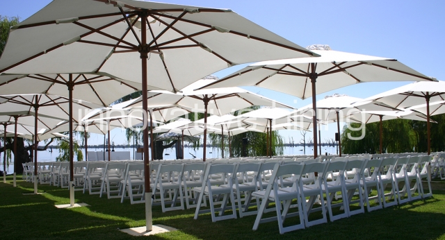 Features: Padded Folding Chairs with Cream Market Umbrellas